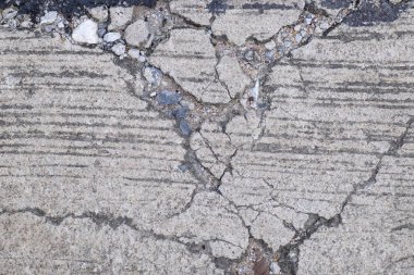 Arka plan görüntüsü olarak kullanılan eski beton yol.