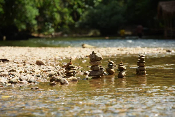 Stones on river coast at daytime