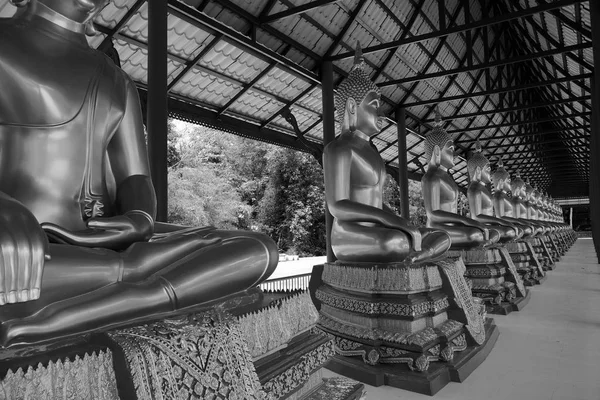 Golden Buddha Burmese art Thai style mixed Thai art. The border of Thailand.Thailand. Golden Buddha Three Pagodas, religious symbols based on the Burmese War.