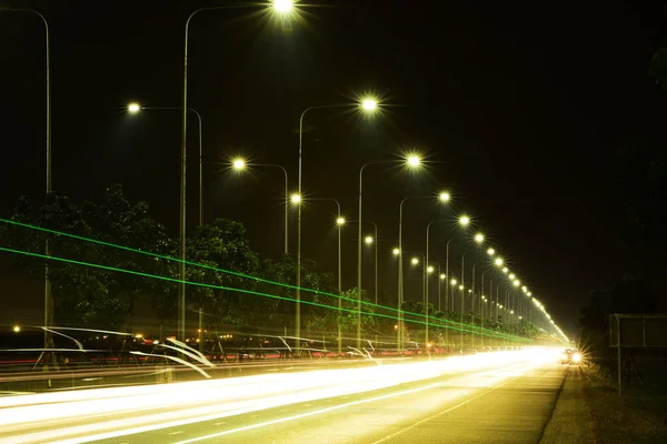 empty highway lighting at nighttime, copy space