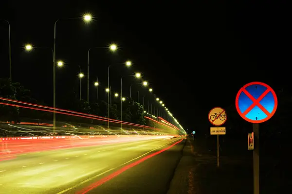 empty highway lighting at nighttime, copy space