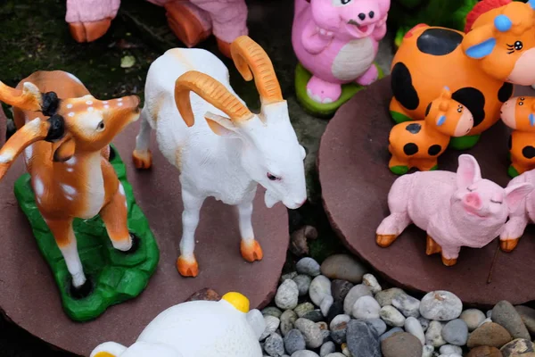 view of ceramic garden figures at market place