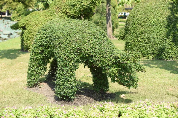 stock image Animal statue in green garden