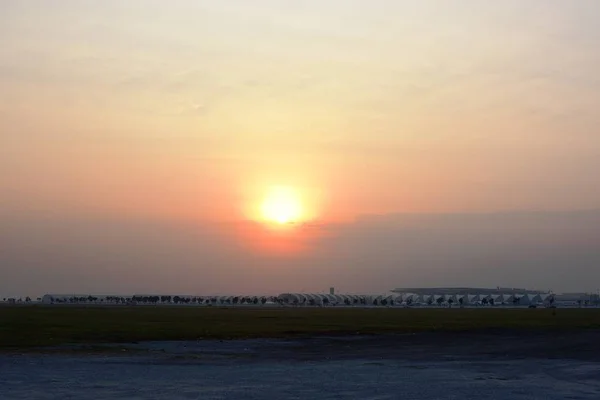 Modern airport at sunset time