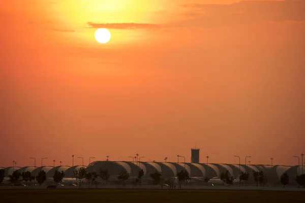 Modern airport at sunset time