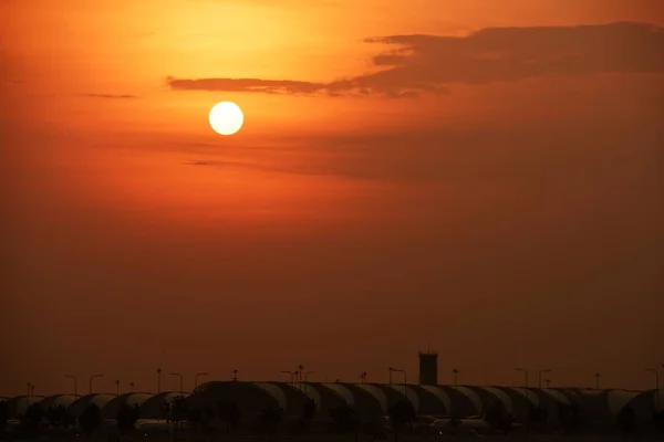 Modern airport at sunset time