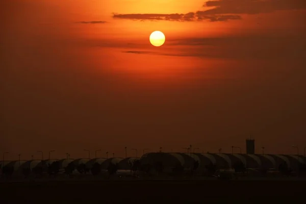 Modern airport at sunset time