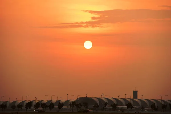 Modern airport at sunset time