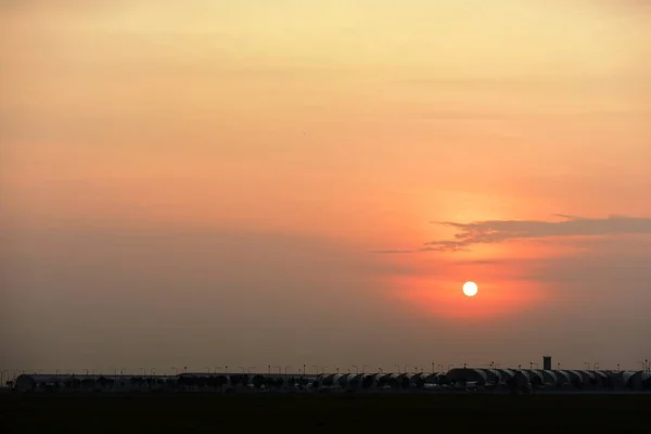 Modern airport at sunset time