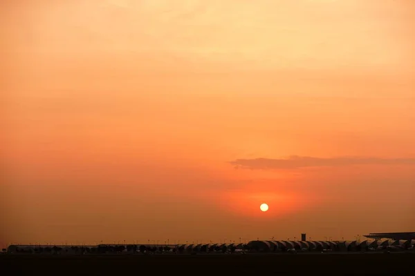 Modern airport at sunset time