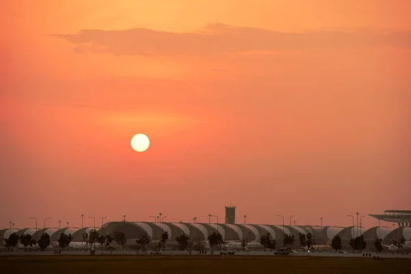 Modern airport at sunset time