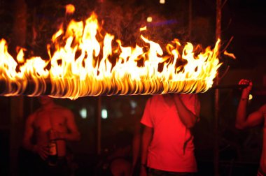 21 April, 2002 - Thailand: People resting with fire at night time
