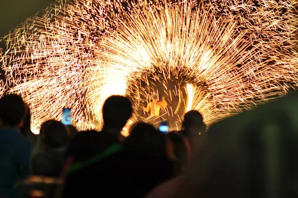 Fire show performance at a beachfront restaurant in Thailand tourist attraction