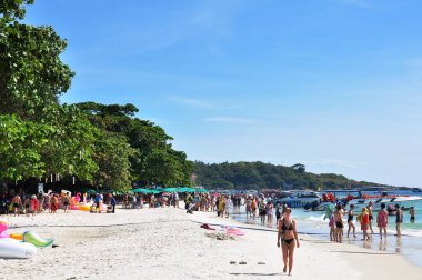 22 April, 2002 - Thailand: People resting on sea coast