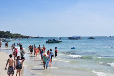22 April, 2002 - Thailand: People resting on sea coast