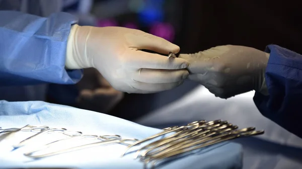 stock image surgeons in operating room, medical team and equipment in the hospital 