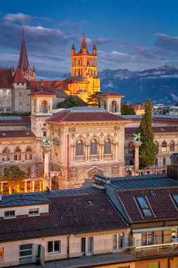 City of Lausanne. Cityscape image of downtown Lausanne, Switzerland during twilight blue hour. clipart