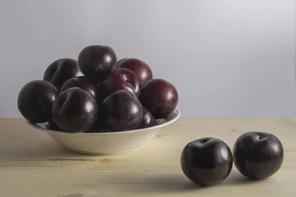 Still Life Bowl Plums Three Loose Wooden Background — Stock Photo, Image