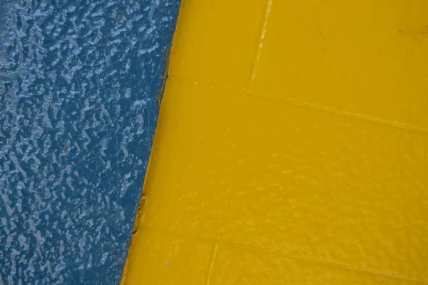 Fondo Granulado Azul Amarillo Una Pared Edificio — Foto de Stock