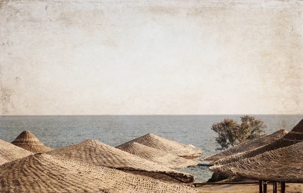 Artwork in vintage style, Sea landscape, beach umbrellas, Egypt, — Stock Photo, Image
