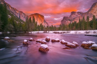 Yosemite National Park at dusk with snow caps clipart