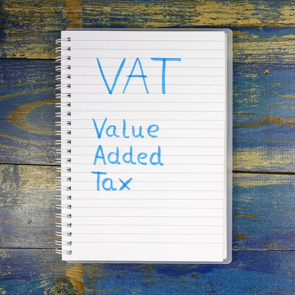 VAT- Value Added Tax written in notebook