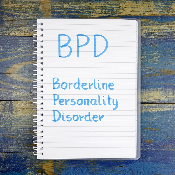 BPD - Borderline személyiségzavar írt notebook fából készült háttér — Stock Fotó