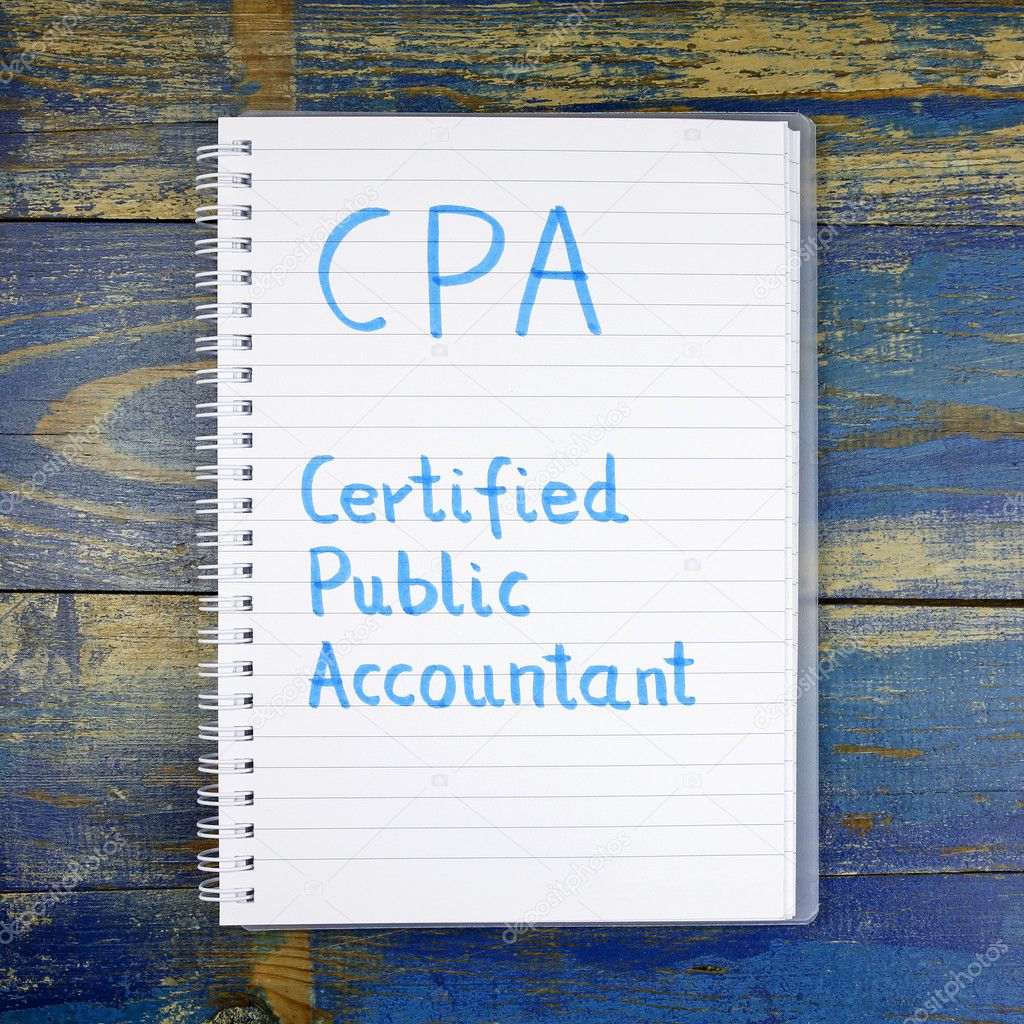 CPA- Certified Public Accountant written in notebook on wooden background