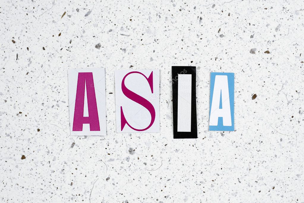 Asia word cut from newspaper on handmade paper texture