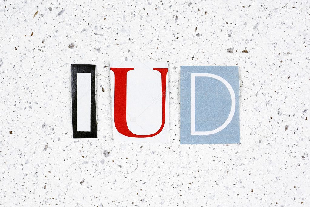 IUD (Intra Uterine Device) acronym on handmade paper texture