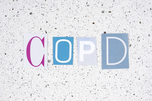 DPOC (Doença Pulmonar Obstrutiva Crônica) acrônimo de textura de papel artesanal — Fotografia de Stock
