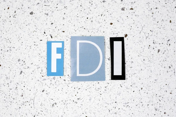 Acronimo FDI (Foreign Direct Investment) su carta tessuta fatta a mano — Foto Stock