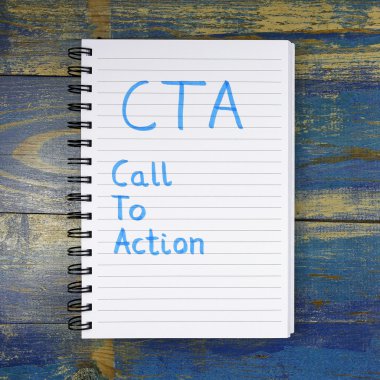 CTA - için ahşap arka plan üzerinde defterde yazılı eylemi çağırma