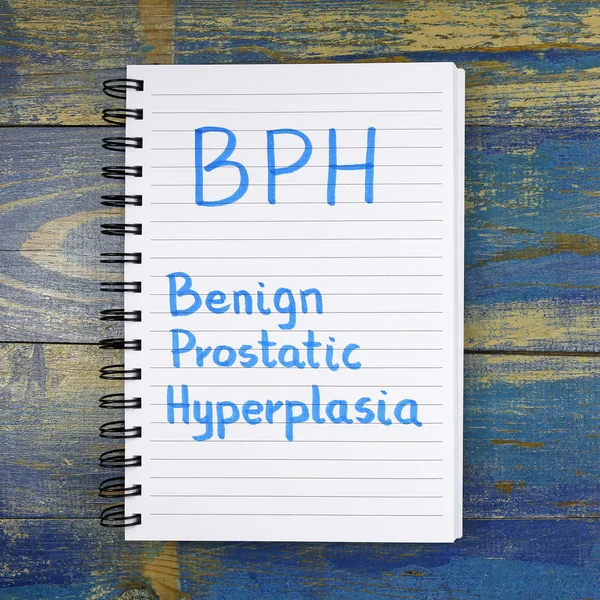 BPH- Benign Prostatische Hyperplasie acroniem geschreven in notebook op houten achtergrond — Stockfoto