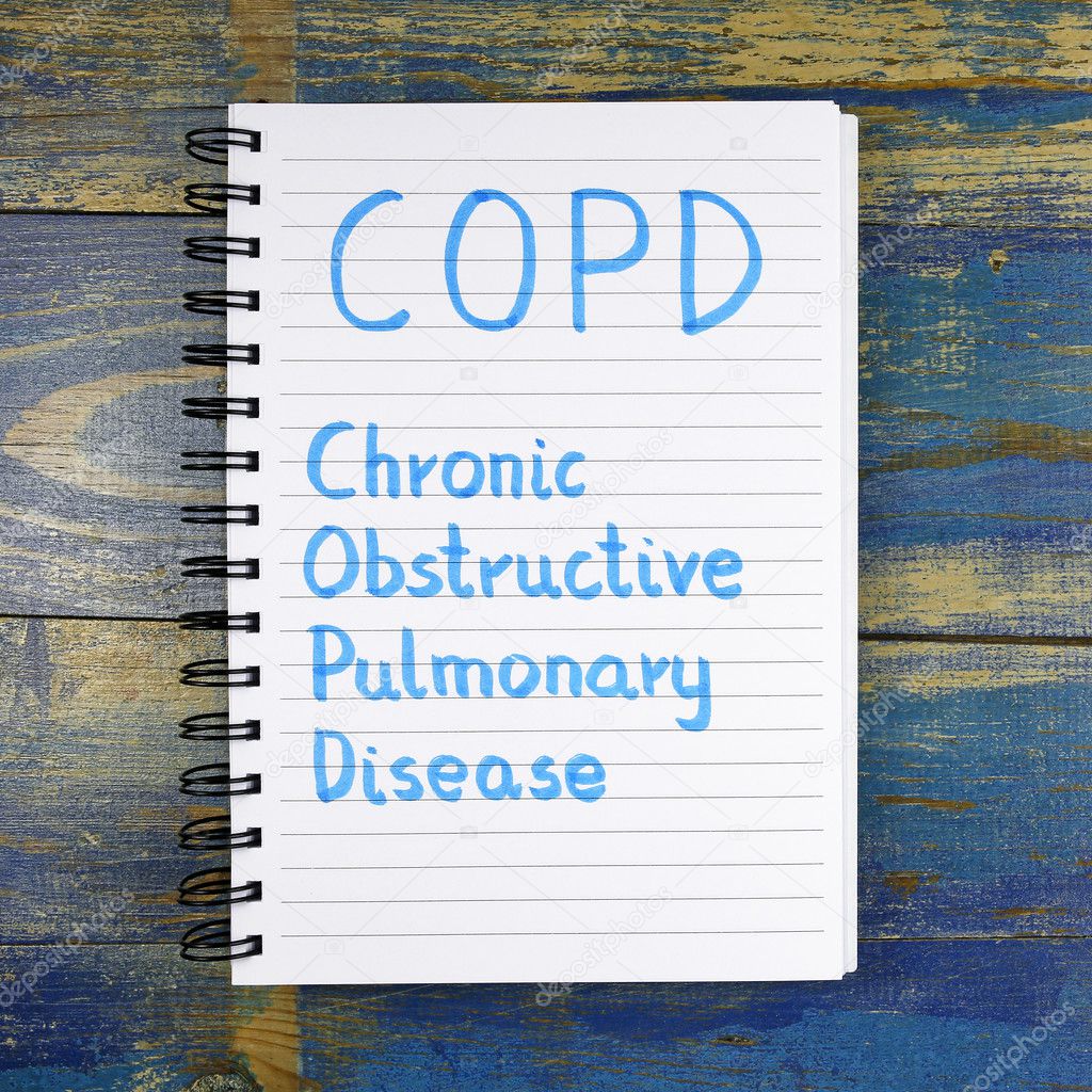 COPD- Chronic Obstructive Pulmonary Disease acronym written in notebook on wooden background