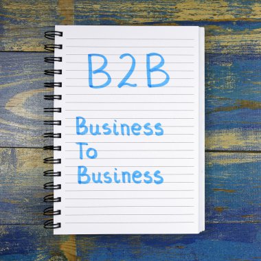Ahşap arka plan üzerinde defterde yazılı B2b Business To Business metin