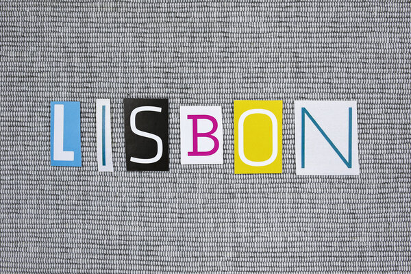 Lisbon word cut from newspaper