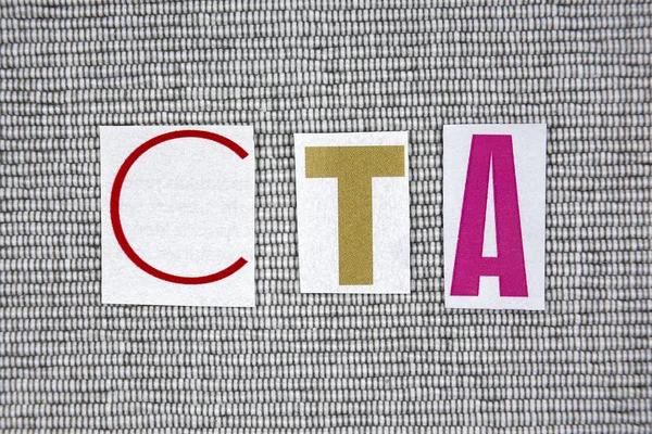 CTA (Call To Action) acronym on grey background — Stock Photo, Image