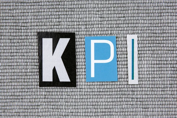 Kpi (Key Performance Indicator) Akronym auf grauem Hintergrund — Stockfoto