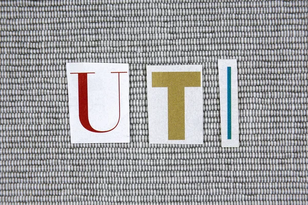 UTI (Urinary Tract Infection) acronym on grey background — Stock Image UTI (Urinary Tract Infection) acronym on grey background Stock Image