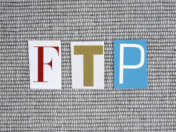 FTP (File Transfer Protocol) acronym on grey background