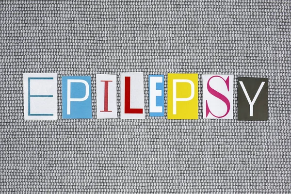 Epilessia parola su sfondo grigio, concetto medico — Foto Stock