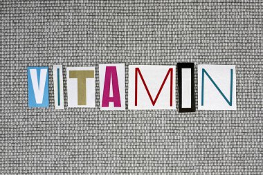 vitamini kelime gri arka plan, tıbbi kavramı üzerinde