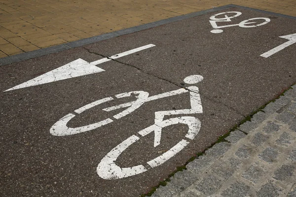 Bicycle road sign on asphalt — Stock Photo, Image