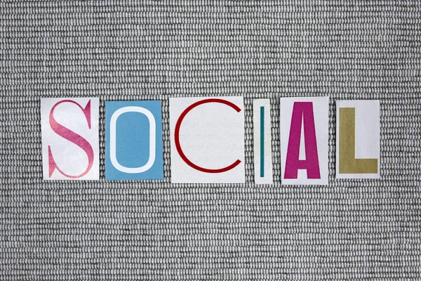 Sociální slovo na šedém pozadí — Stock fotografie