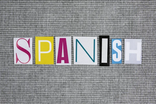 Spanish word on grey background — Stock Photo, Image