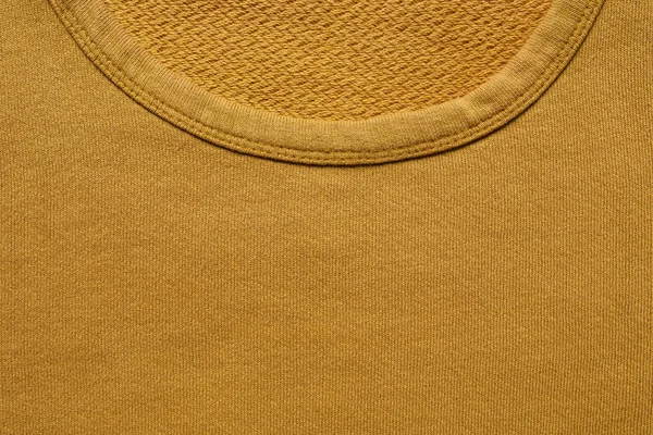 Closeup of yellow sweatshirt — Stock Photo, Image