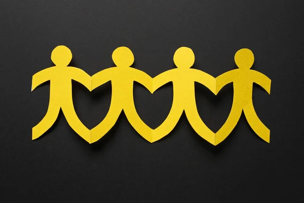 Gelbe Papiermenschen, Teamwork-Konzept — Stockfoto