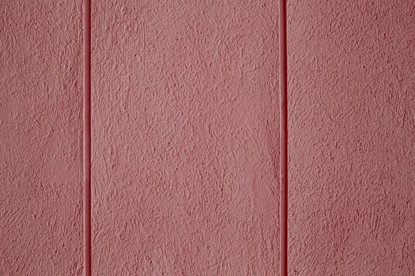 Roze ruwe muur textuur of achtergrond — Stockfoto