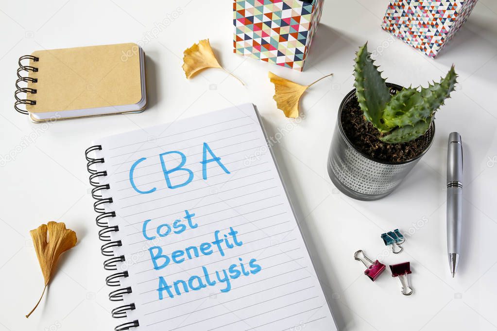 CBA- Cost���benefit Analysis written in notebook on white table